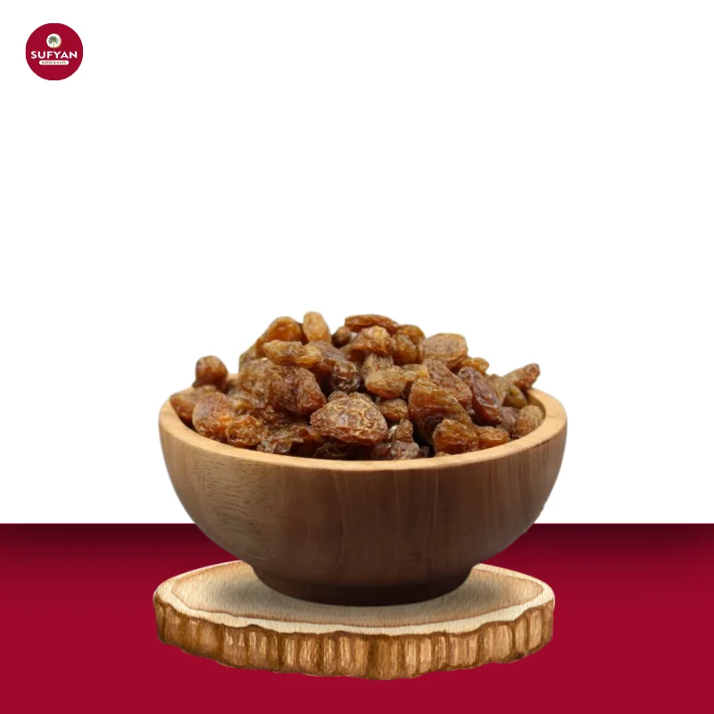 close-shot-of-a-tasty-sweet-chewy-golden-brownish-munakka-in-a-wooden-bowl