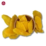 top-view-of-a-naturally-sweet-khatta-meetha-dry-mango-in-a-wooden-bowl-and-mango-peices-aside