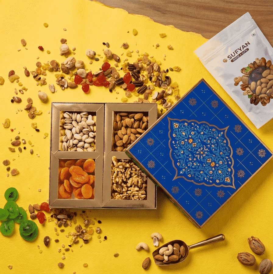 Sufyan Royal Blue and Gold Festive Dry Fruit Gift Box featuring pistachios, almonds, dried apricots, and walnuts