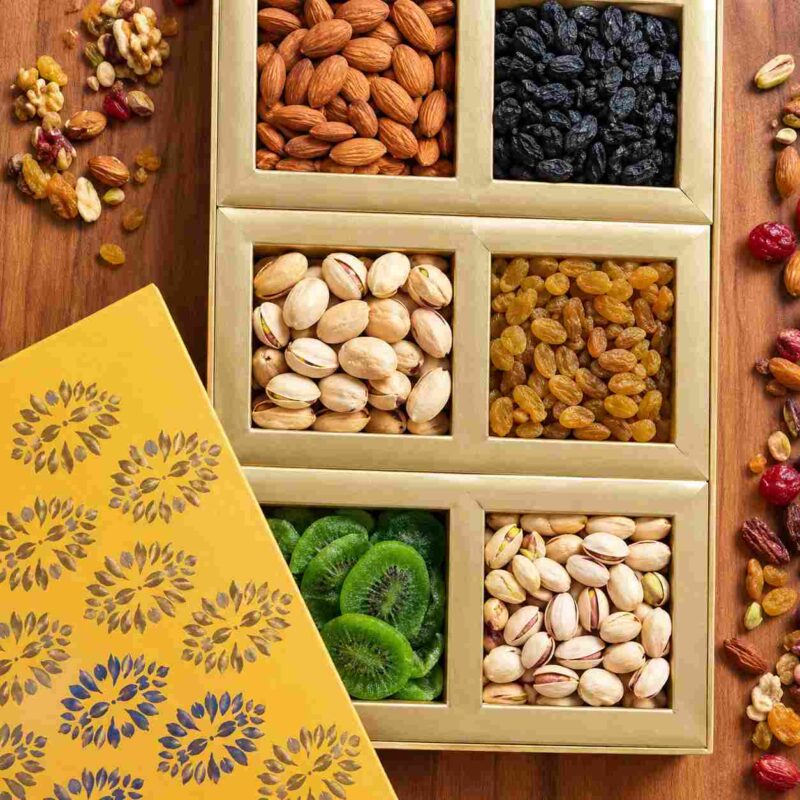 Sufyan Golden Sunburst 6-Chamber Dry Fruit Gift Box featuring almonds, black raisins, pistachios, golden raisins, and dried kiwi slices with gold floral pattern lid